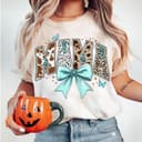 Coquette Western Mama Shirt with Cow Print, Turquoise & Bow Detail 2 small thumbnail