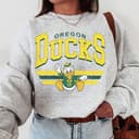Sudadera Unisex Oregon Ducks Vintage NCAA Fútbol - Regalo para Fans 1 small thumbnail